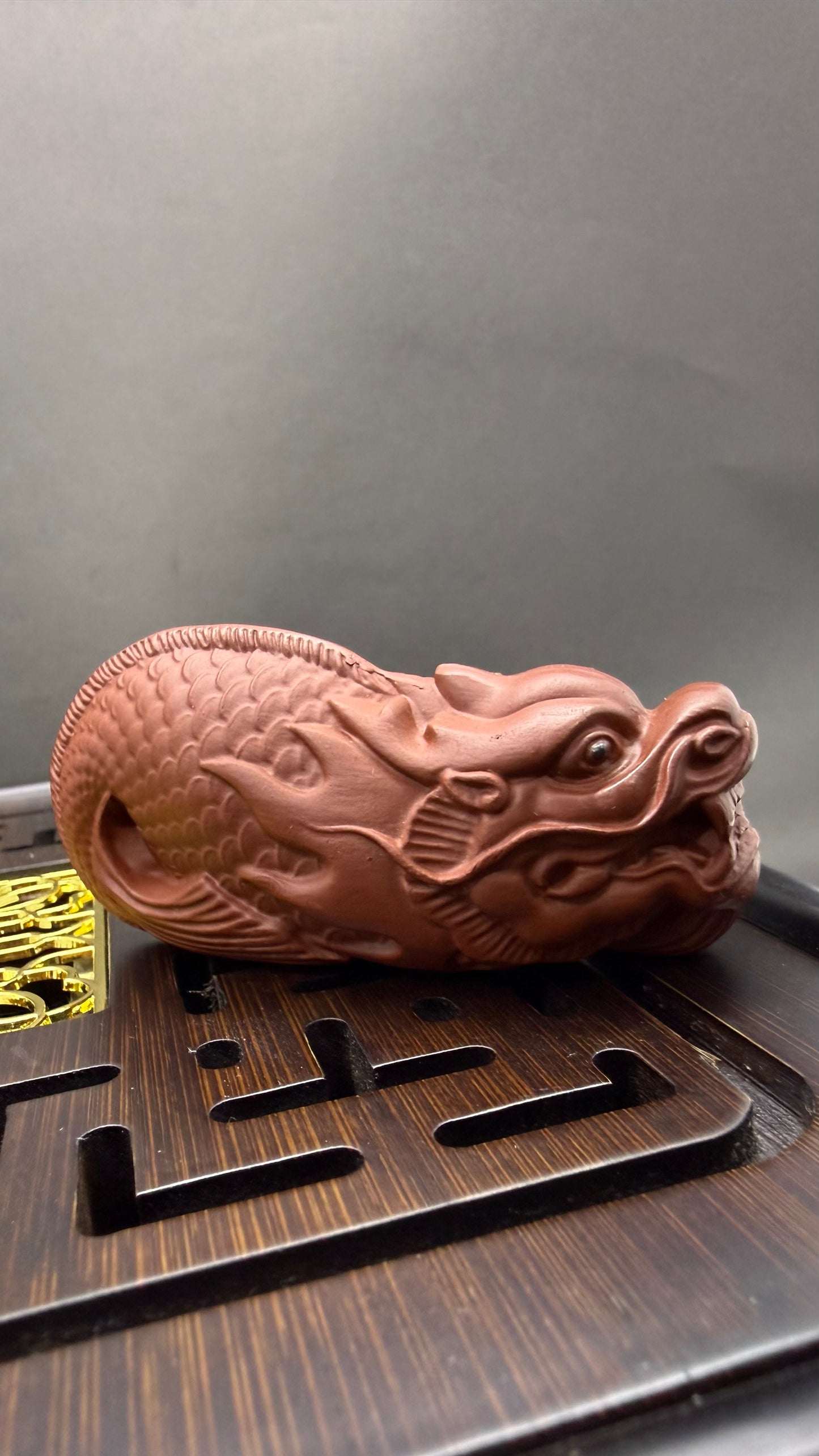 “Amber Dragon ceramic tea accessory”
