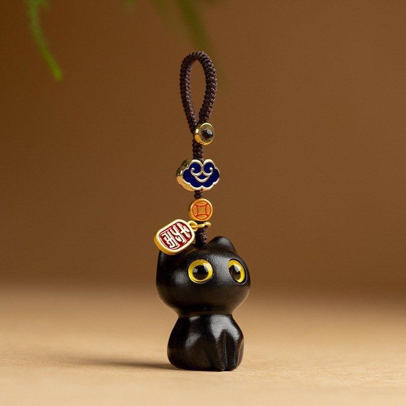 Handmade wood lucky cat keychain souvenir from Bali — Gaba Tea House