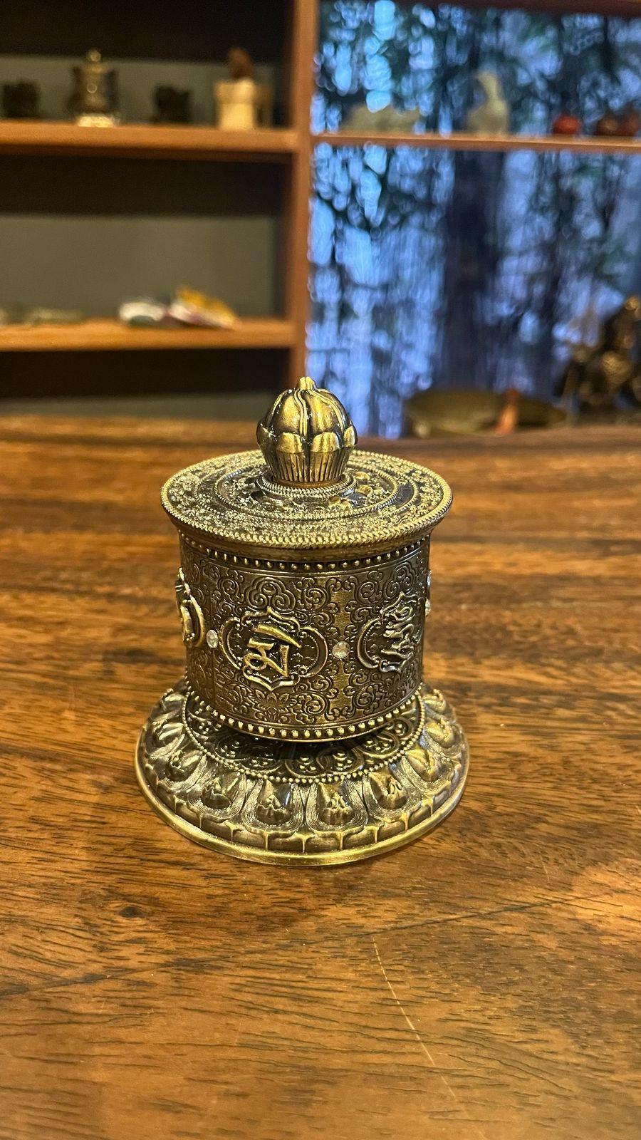 Sacred Flow: Ornate Tibetan Prayer Wheel