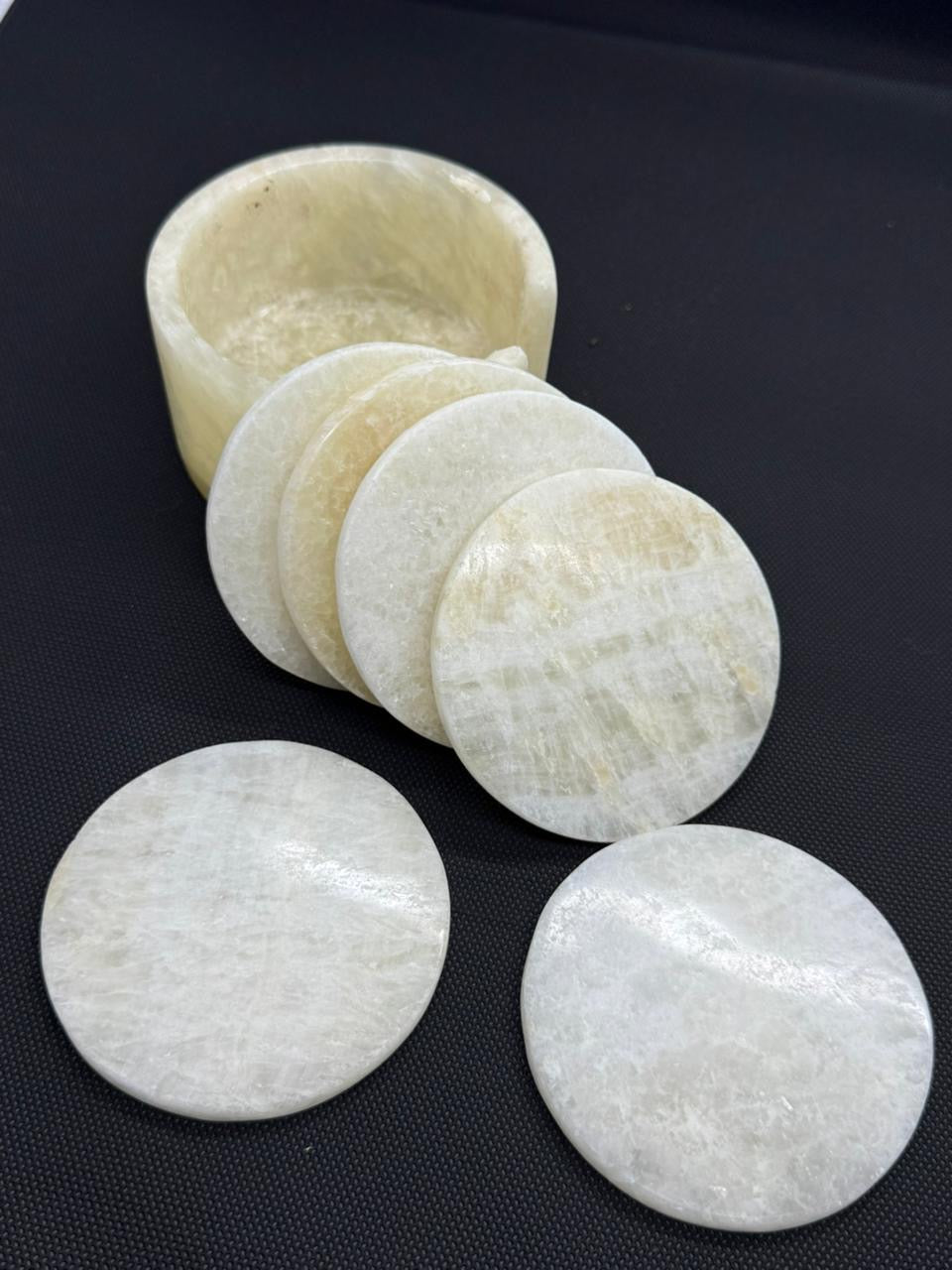 “Polished onyx tea stands with natural stone pattern”