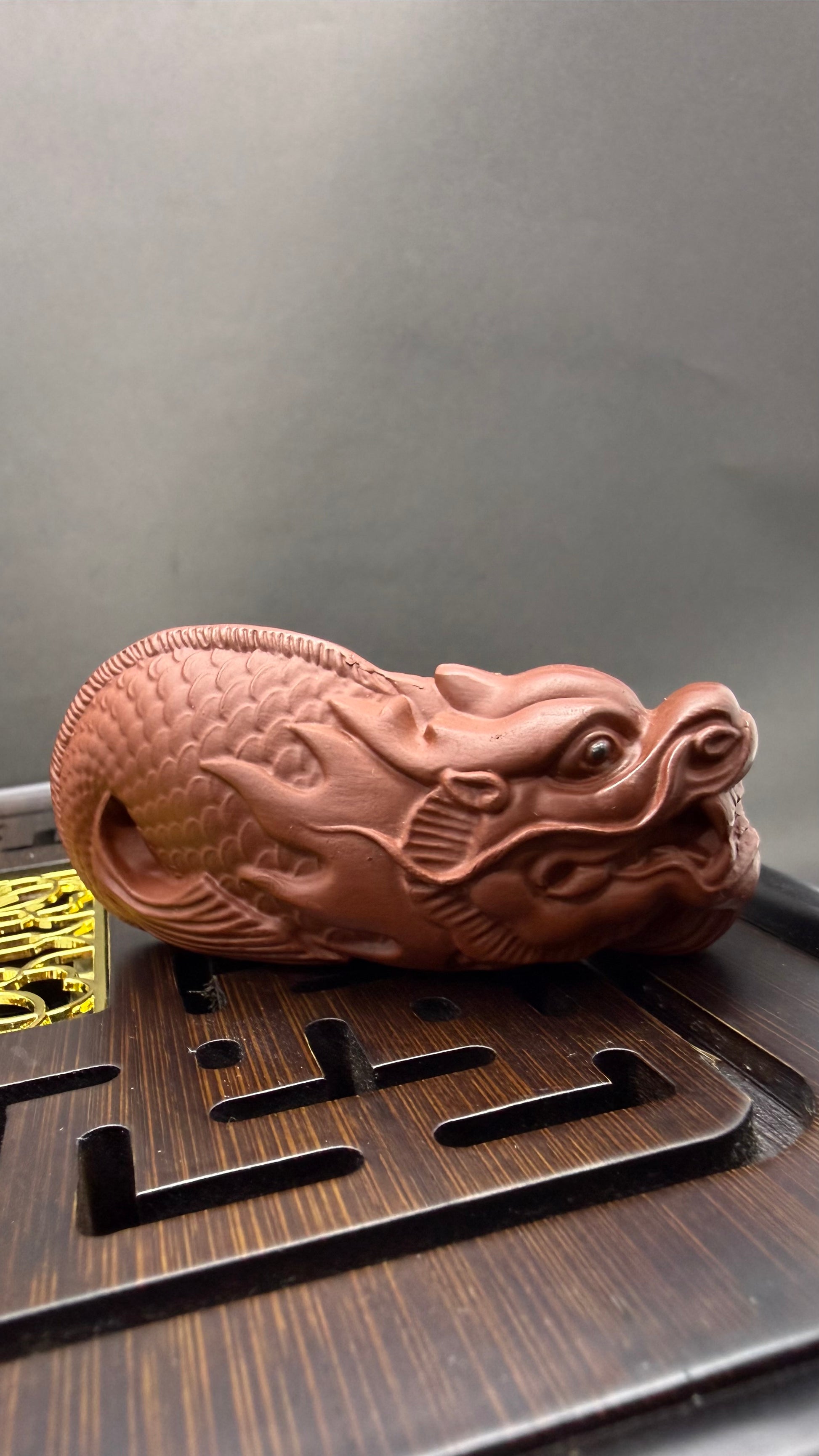 “Amber Dragon ceramic tea accessory” 