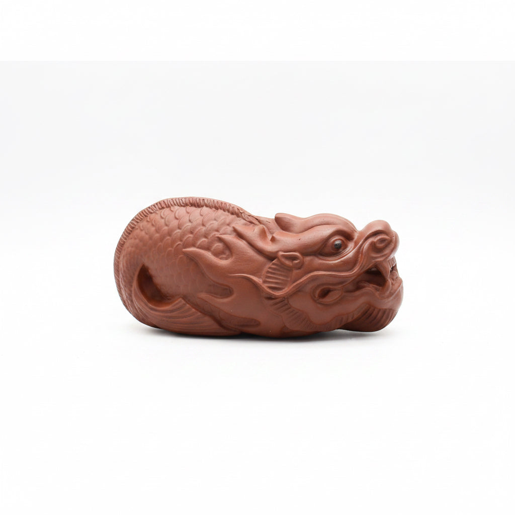 “Amber Dragon ceramic tea accessory” 