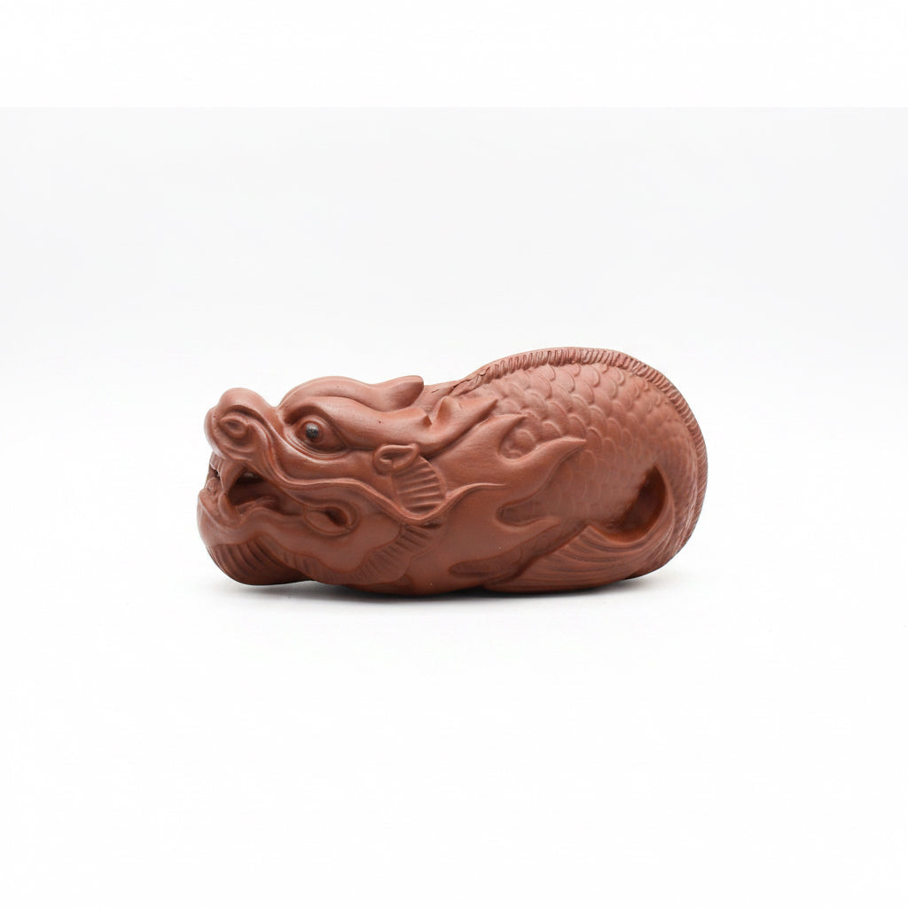 “Amber Dragon ceramic tea accessory” 
