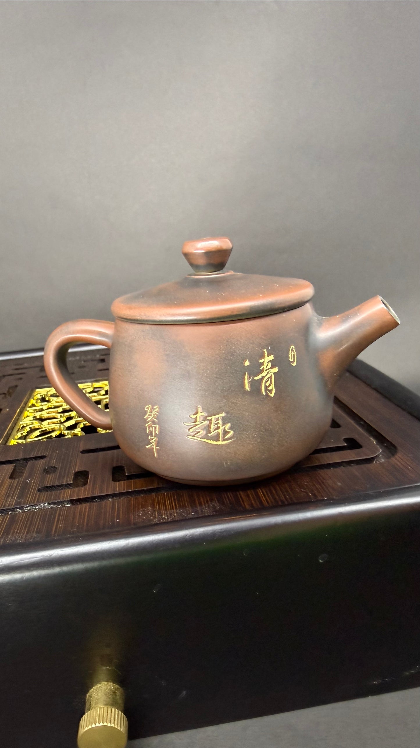 Yixing teapot with sculpted branch and bird