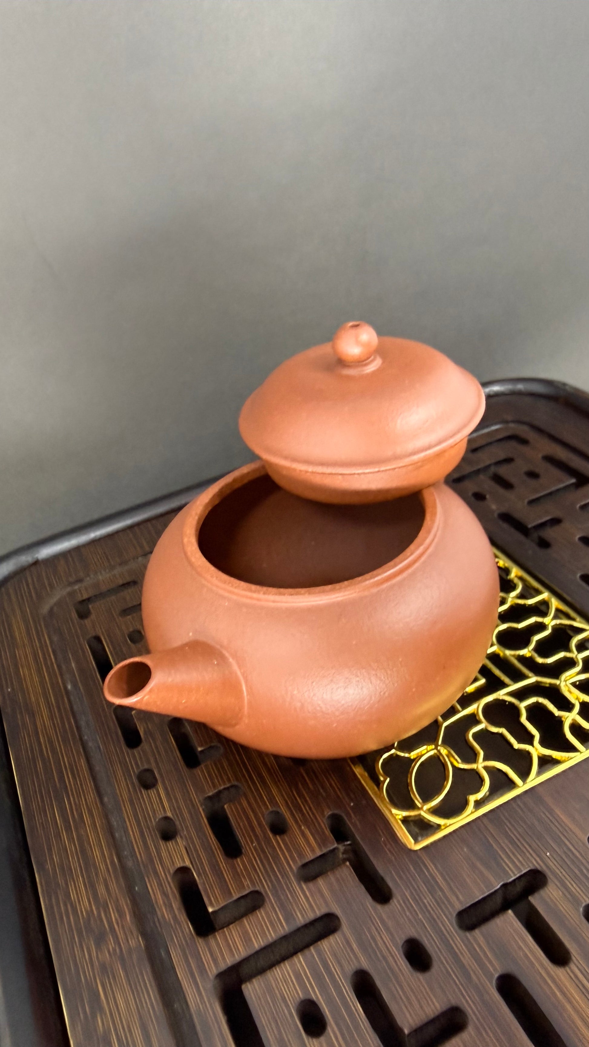 “Medium Yixing teapot for gongfu tea brewing”