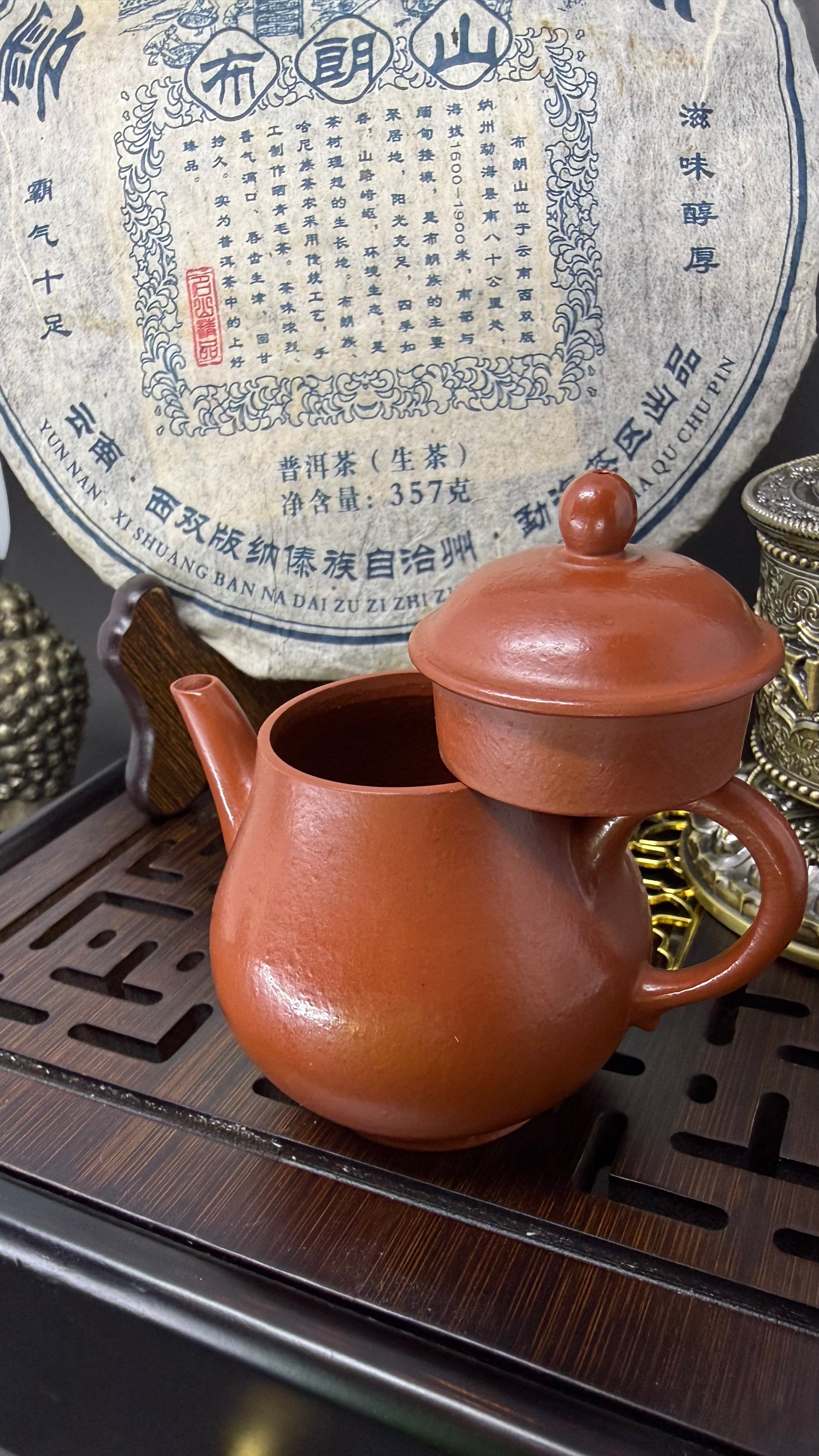 “Amber Drift Yixing teapot on tea tray”