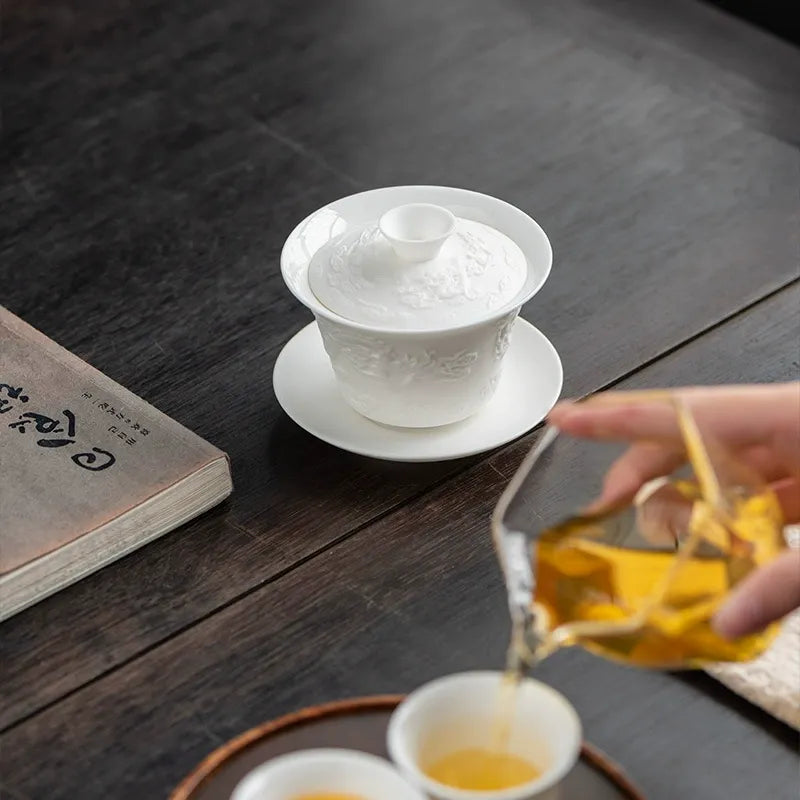 Chinese porcelain gaiwan for tea ceremonies with dragon motif