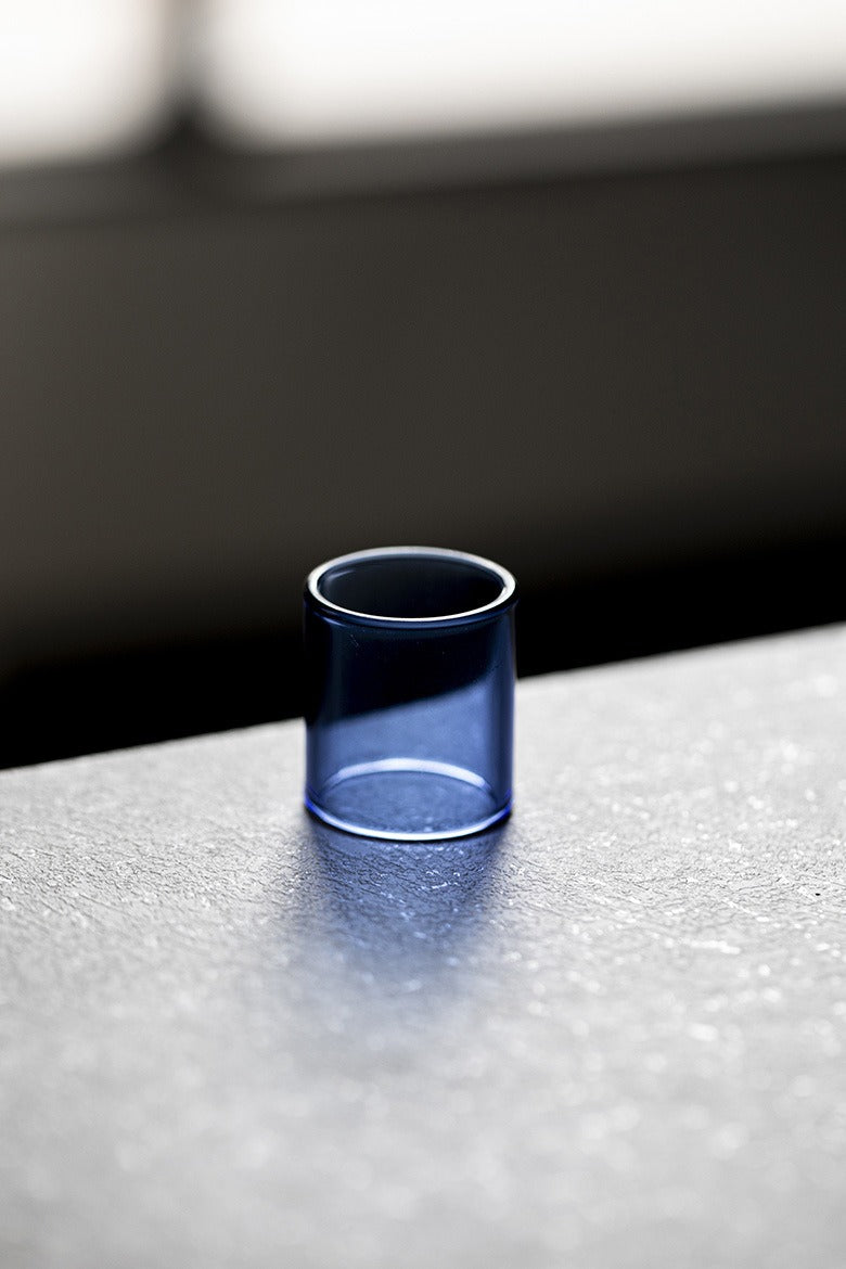 Heat-resistant glass stand for teapot lids