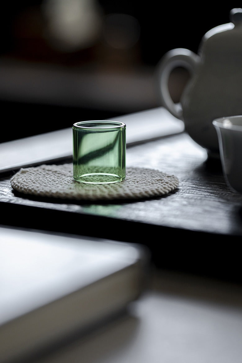 Heat-resistant glass stand for teapot lids